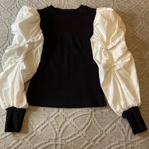 Black knit and white contrast puff sleeved top